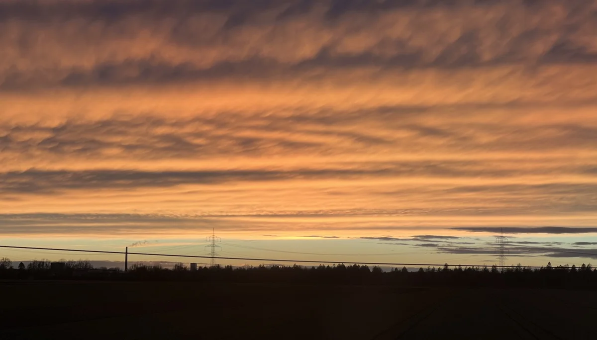 Sonnenuntergang in der RB 87 bei Mering St. Afra | © DAV Augsburg Senioren
